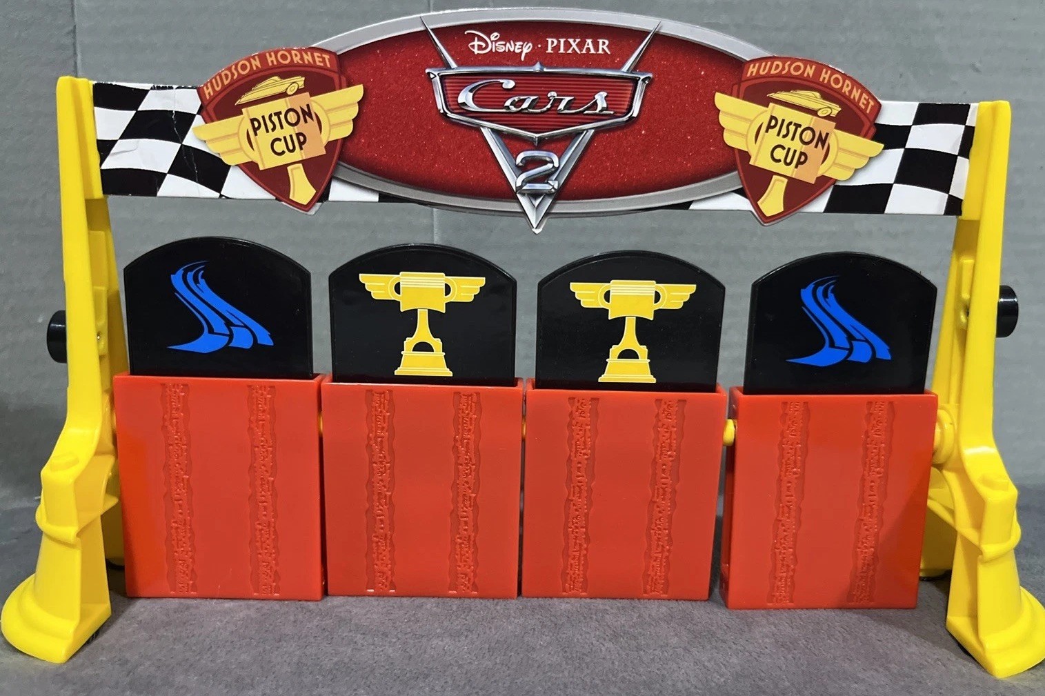 Disney Cars 2 Finish Line Frenzy Piston Cup Trophy Racing Game Lightning McQueen