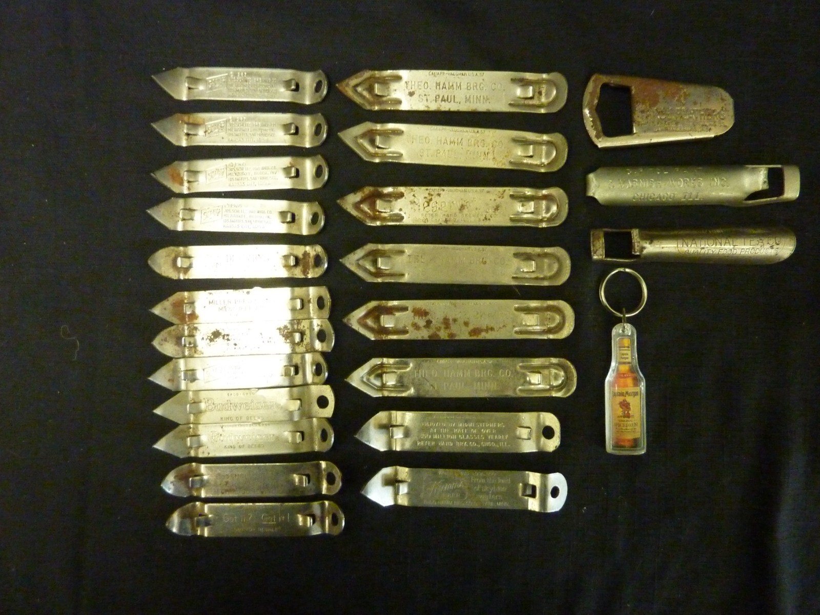 Lot of 23 VINTAGE METAL BOTTLE OPENERS HAMMS PRAGER RESERVE SCHLITZ 3 FEATHERS