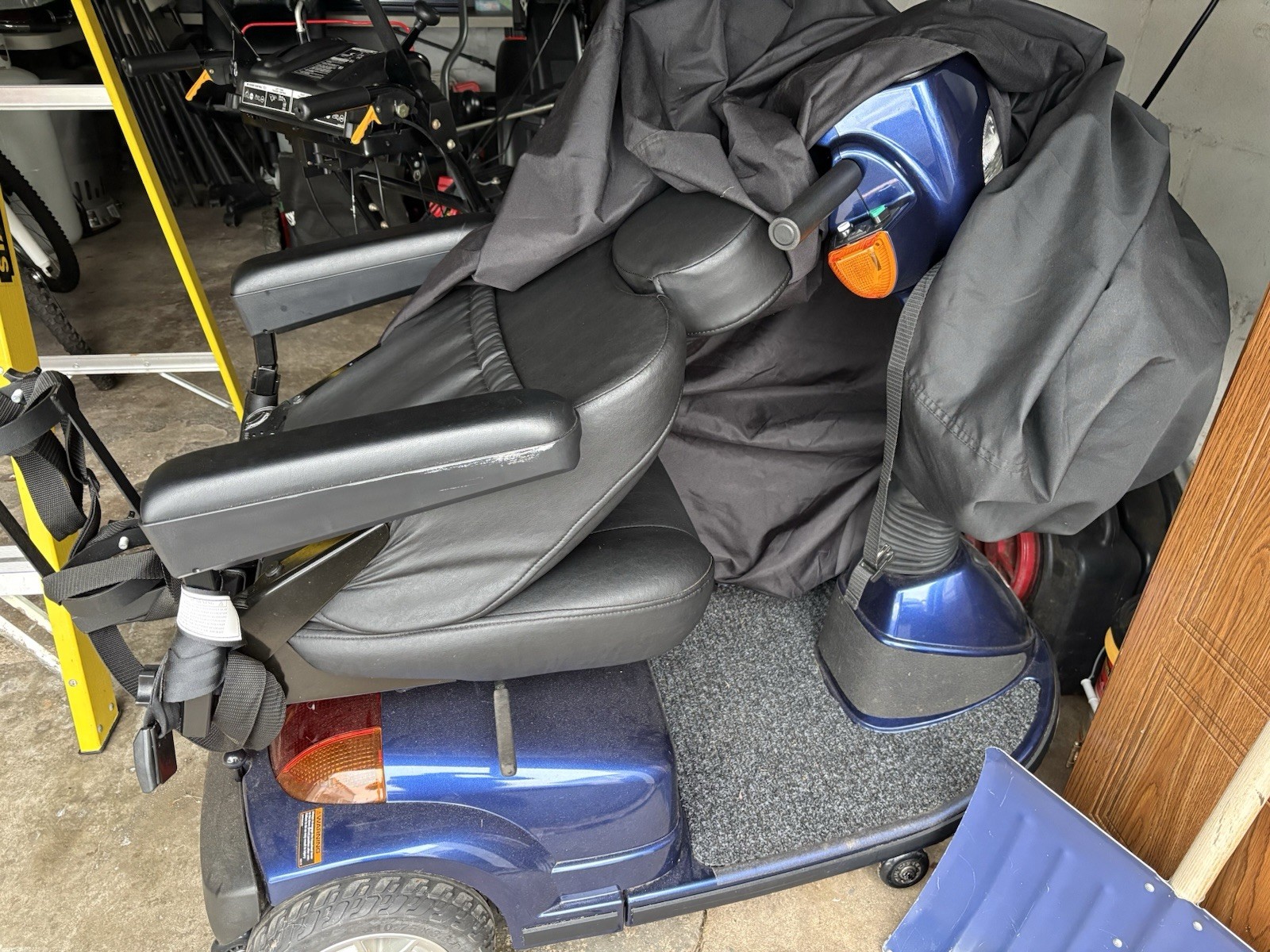Pride Blue 4-Wheeled Electric Mobility Scooter with Swivel Seat and Armrests