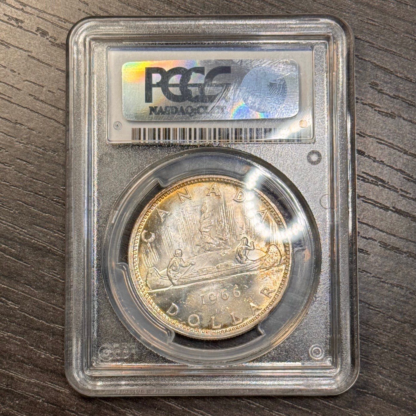 MS64 1966 $1 Canada Voyageur Silver Dollar, PCGS Trueview- Rainbow Toned