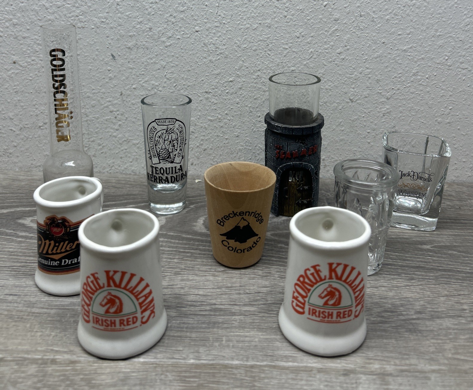 Lot Of 9 Asst. Shot Glasses: Killian’s, Hot Damn!, Jack Daniel’s, Miller, Etc.