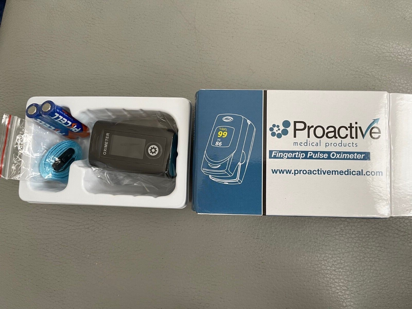 Proactive Fingertip Pulse Oximeter Black with Blue Lanyard and 2 AAA batteries 