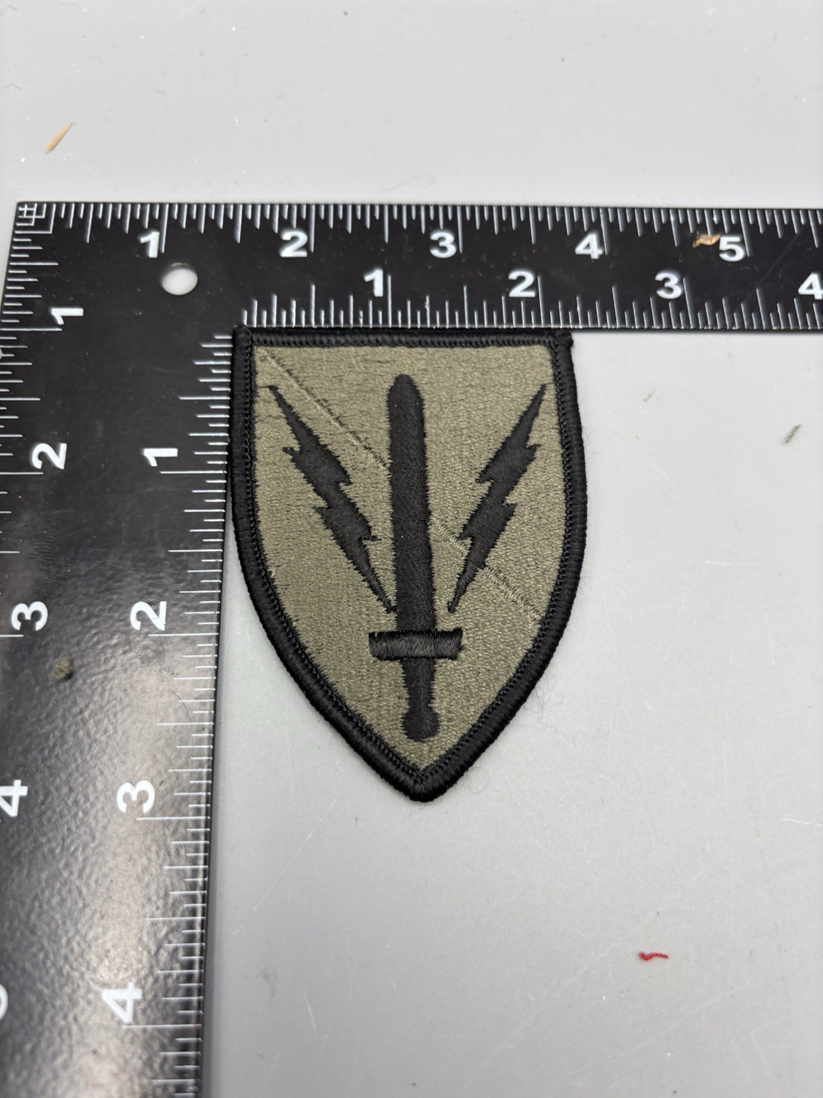 US Army 201st Battlefield Surveillance Brigade Green Subdued Cloth Sew on Patch
