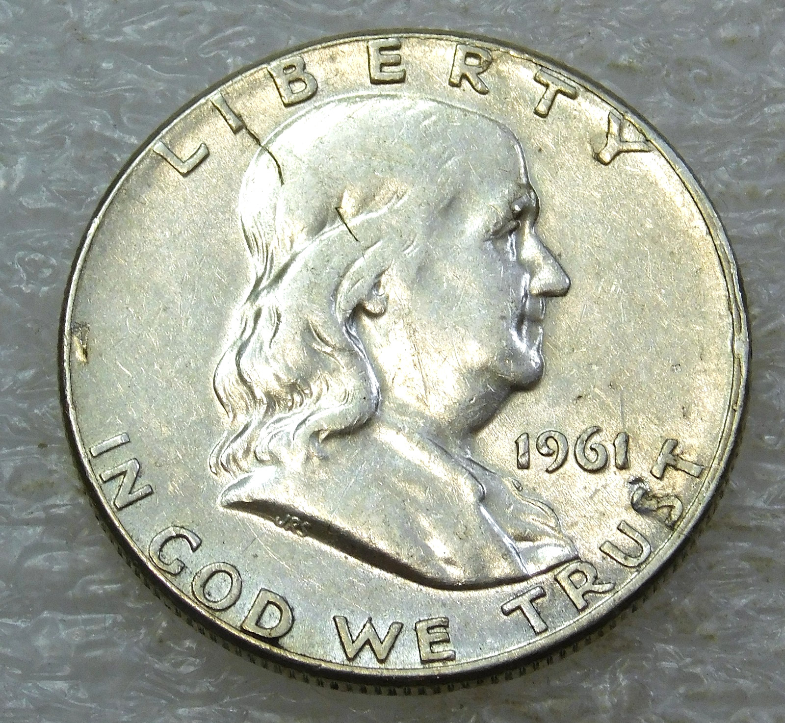 1961 Franklin Half Dollar XF/AU Frosty Bright Luster in saflip #D324