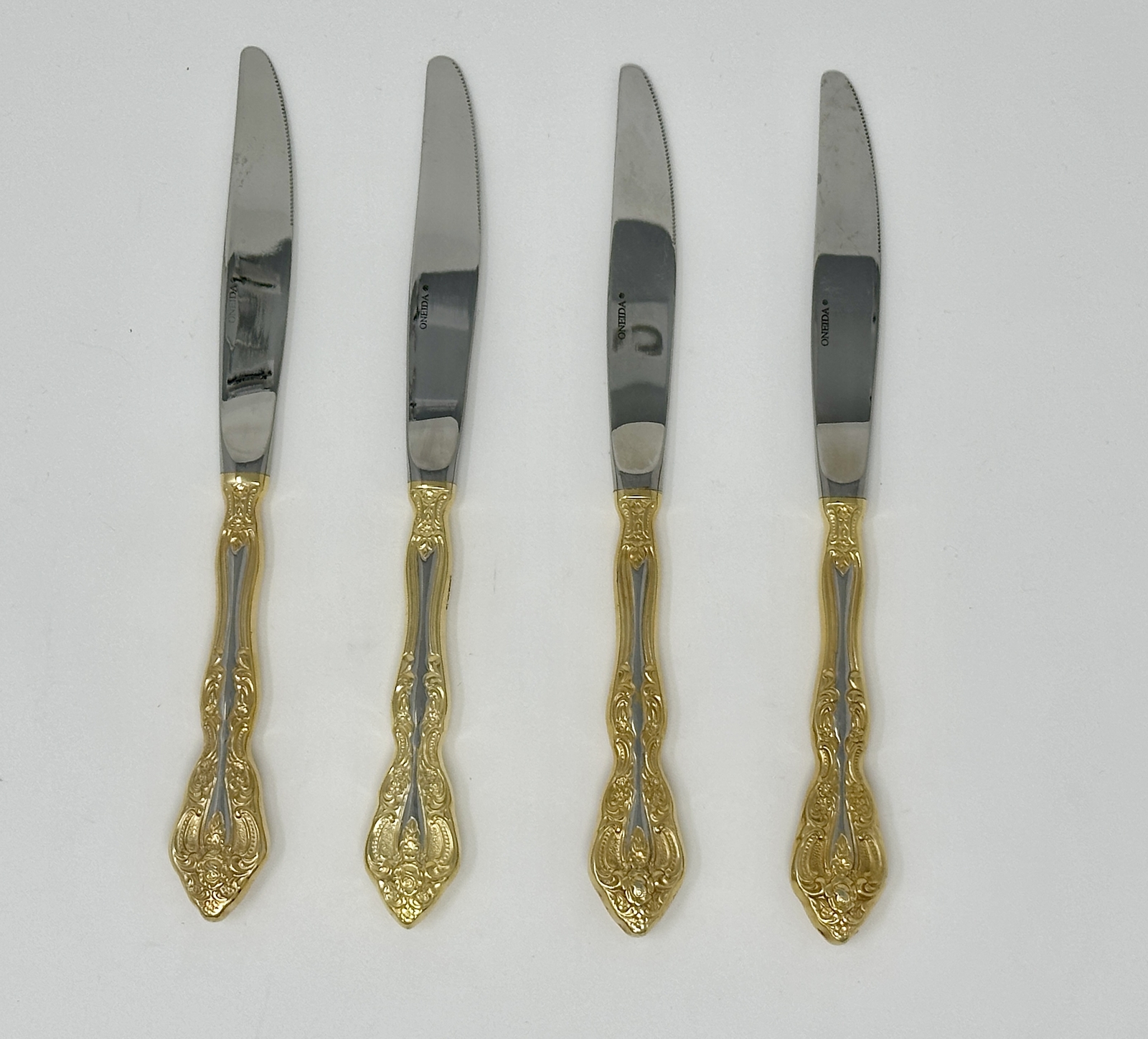 Oneida Golden Michelangelo Set of 4 Dinner Knives 9" Quality 18/10 Stainless