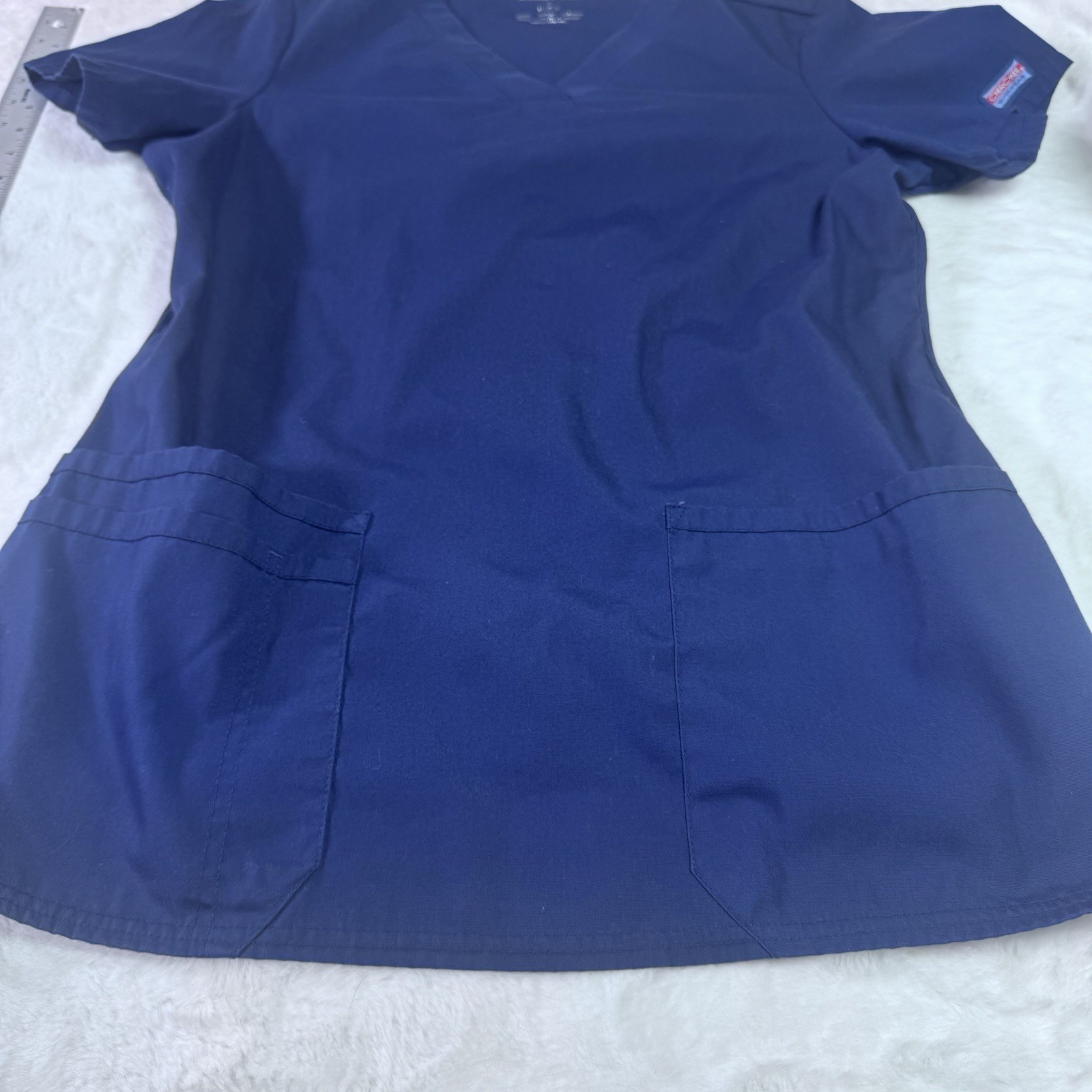 Cherokee scrub top Size Medium Navy Blue Short Sleeve Front Pickets Ribbed Sides