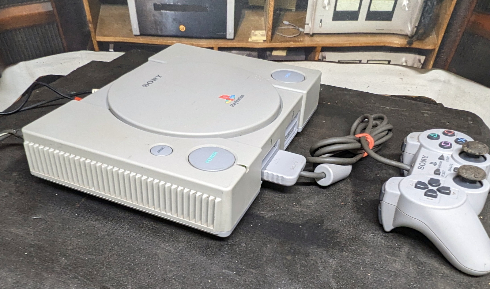Sony Playstation SCPH-5501 with controller setup for audiophile CD player use.