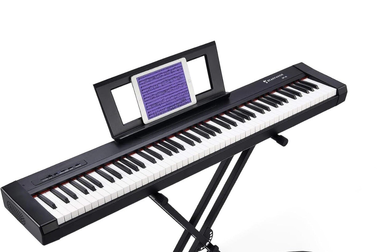 Starfavor Electric Keyboard Bench adjustable 88 keys used.