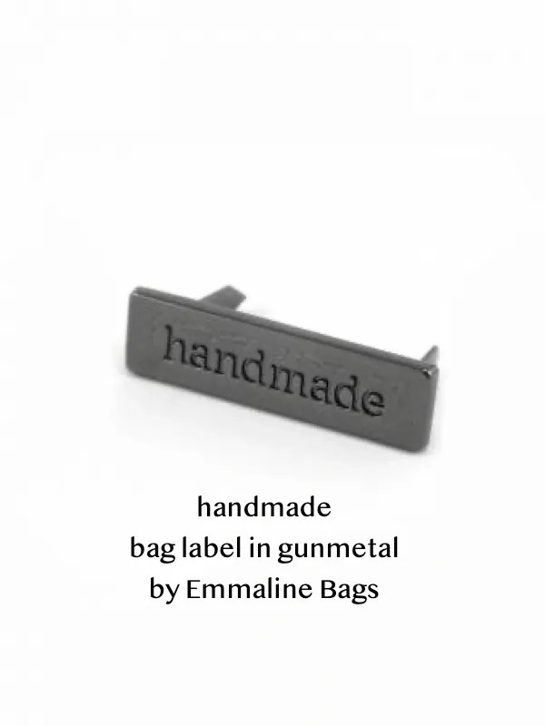 Handmade metal bag label in gunmetal from Emmaline Bags