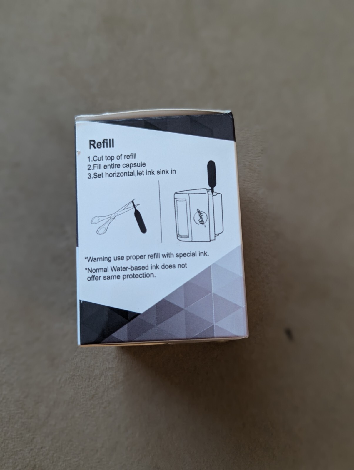 Miseyo I. D. Protection roller stamp with 3 refills and instructions