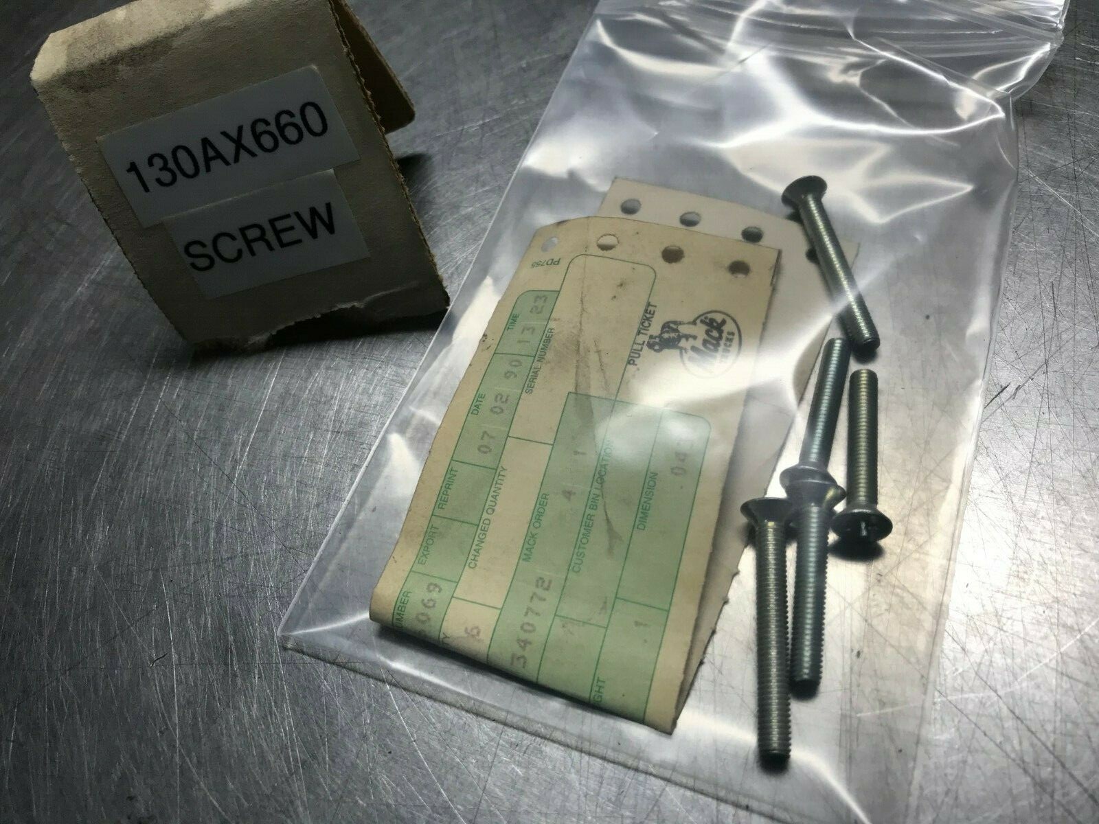 130AX660  MACK   SCREW  QTY of 3  & TWO additional similar screws just longer