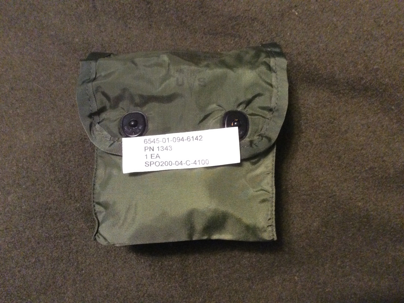 USGI INDIVIDUAL FIRST AID POUCH w/ ALICE Clips. NEW MILITARY
