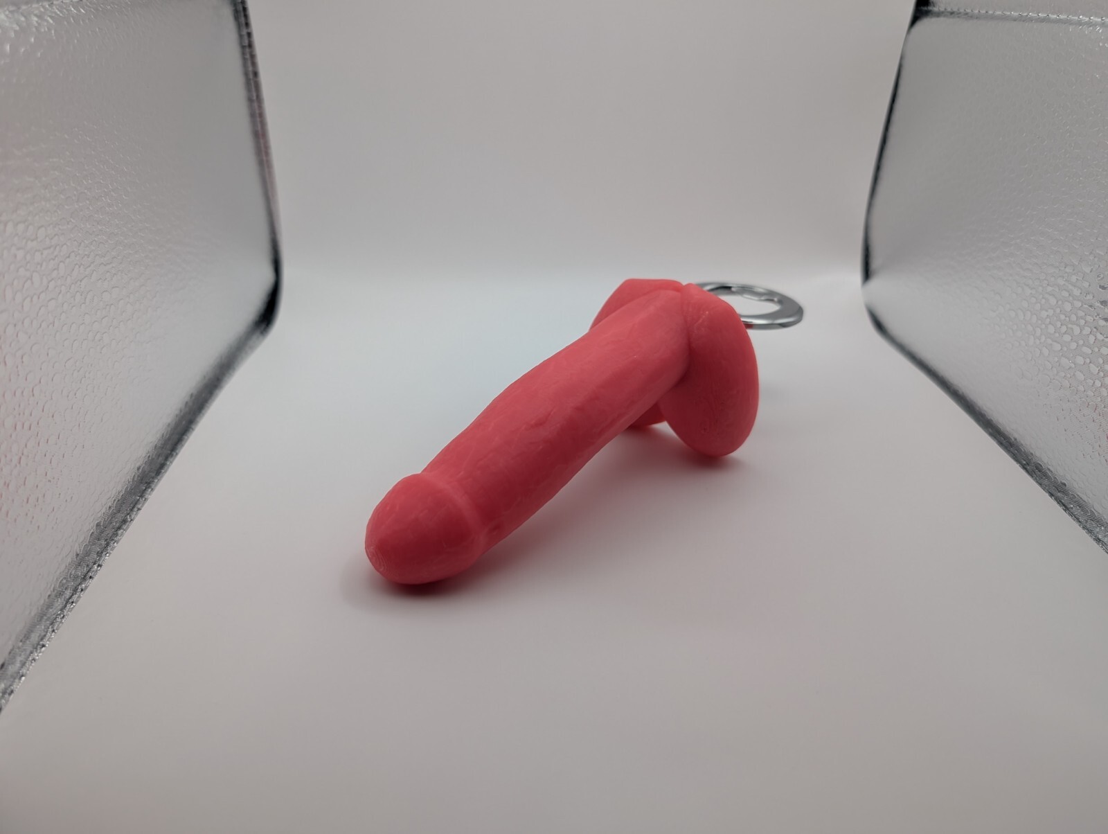 Dick bottle opener in pink color. Great for gifts, parties or tailgating!