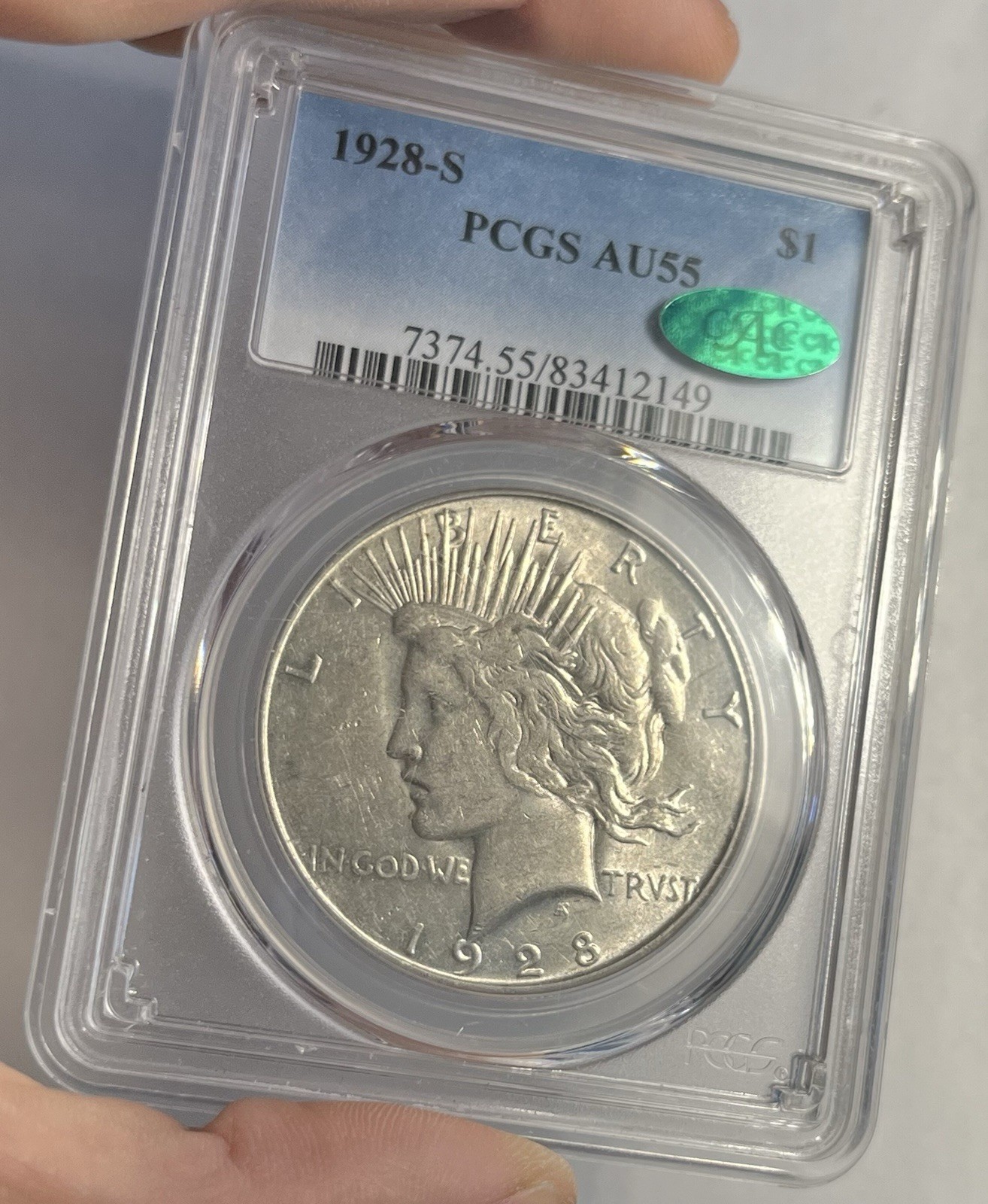 1928-S PEACE DOLLAR GRADED PCGS AU55 CAC