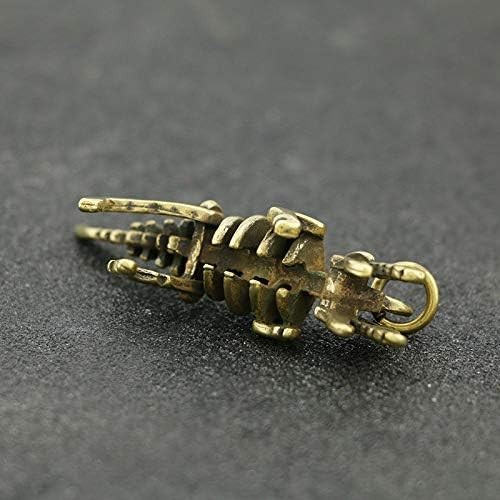 Retro brass creative dinosaur skeleton statue keychain pendant handicrafts