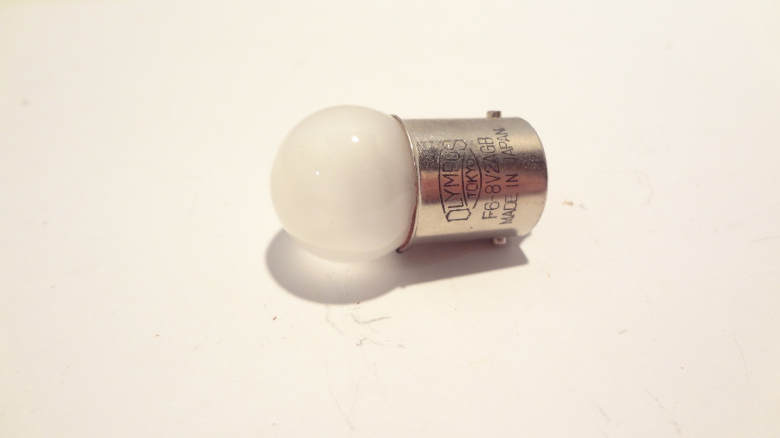 OLYMPUS  BULB  F6-8V/2AGH FROSTED 12 WATT 2AMP *NEW*
