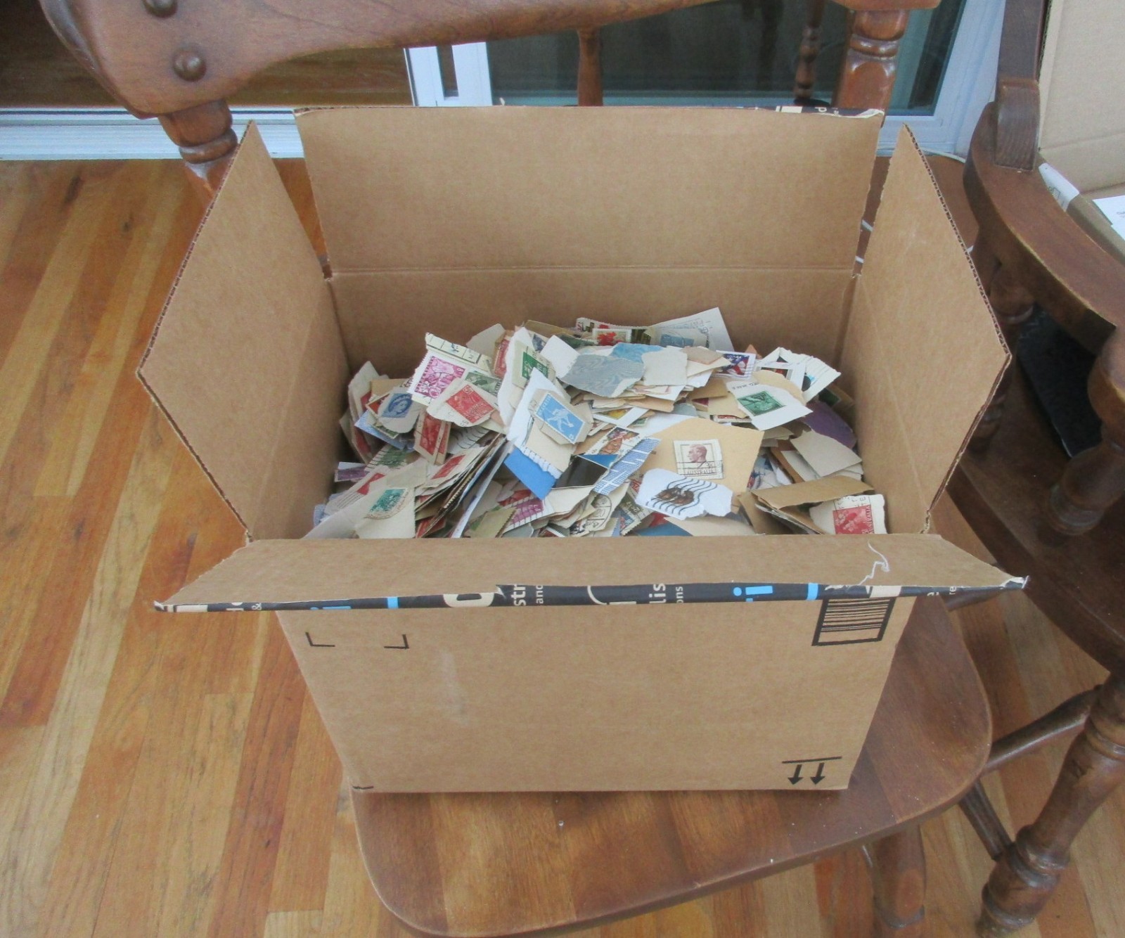 5 pounds of worldwide stamps On Paper- US and Foreign