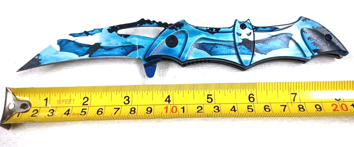 SPRING ASSISTED BATMAN BLUEISH KNIFE 8.25 INCH OVERALL APPROX. 3.75 INCH BLADE