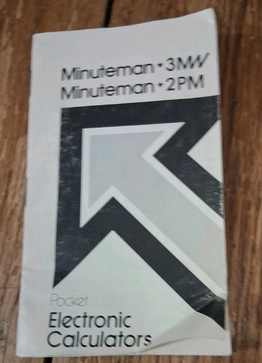 Commodore Minuteman 2-PM Hand Held Calculator W/ Case and Manual*. Untested