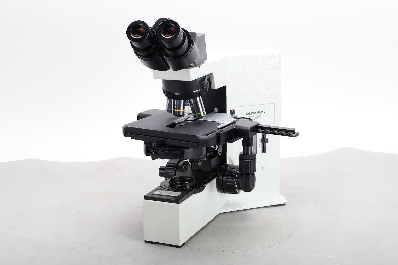Olympus BX40F4 Binocular Microscope W/ 10x/0.25, 20x/0.40, 40x/0.65, N 40x/0.65
