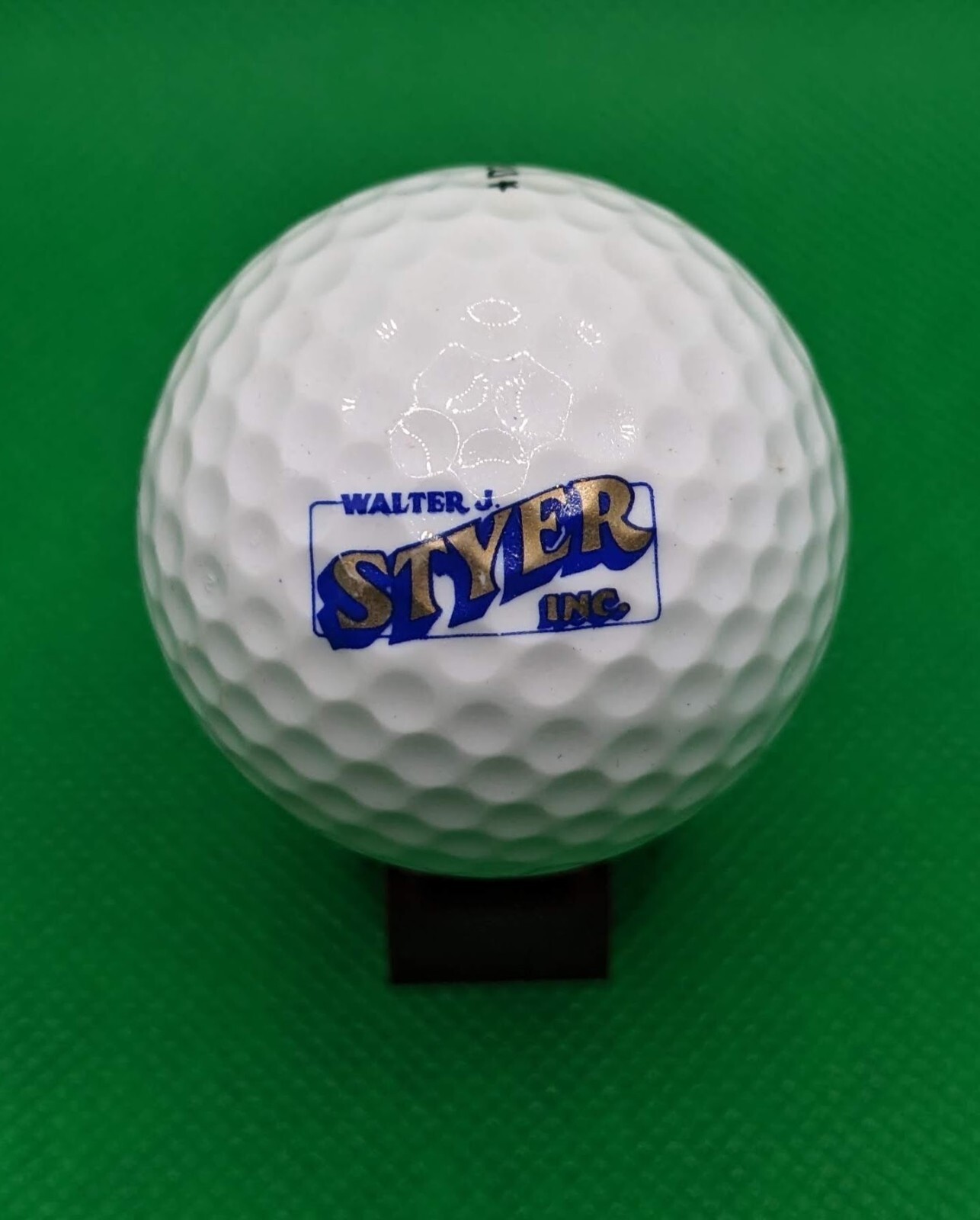 Walter J Styer Inc. logo golf ball