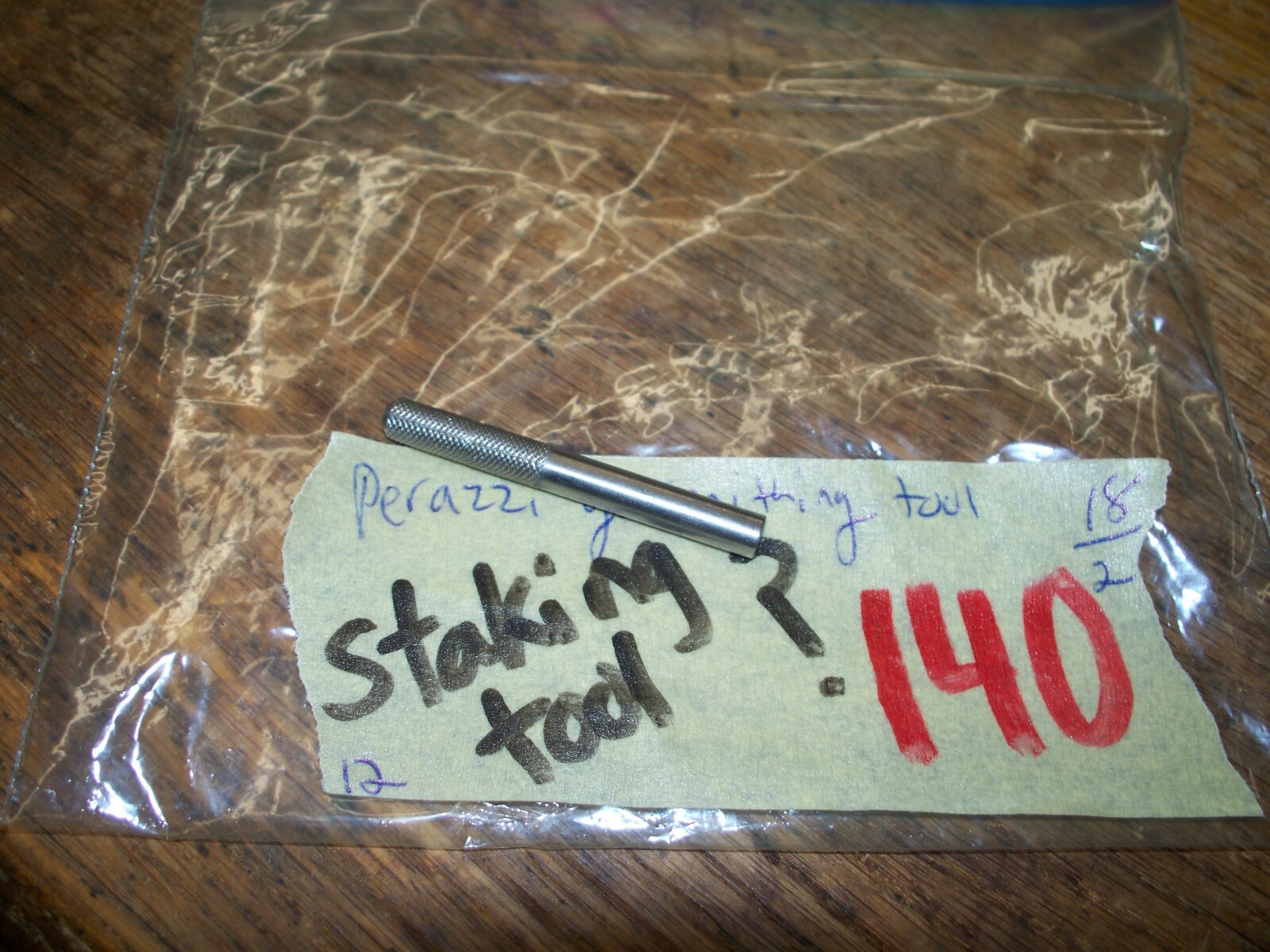 Giuliani pinless hammer leaf spring reverse threaded nut tool