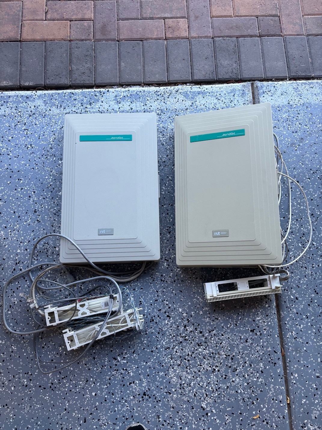 Two Nortel Norstar 6x16 Meridian telephone system & 11 Phones