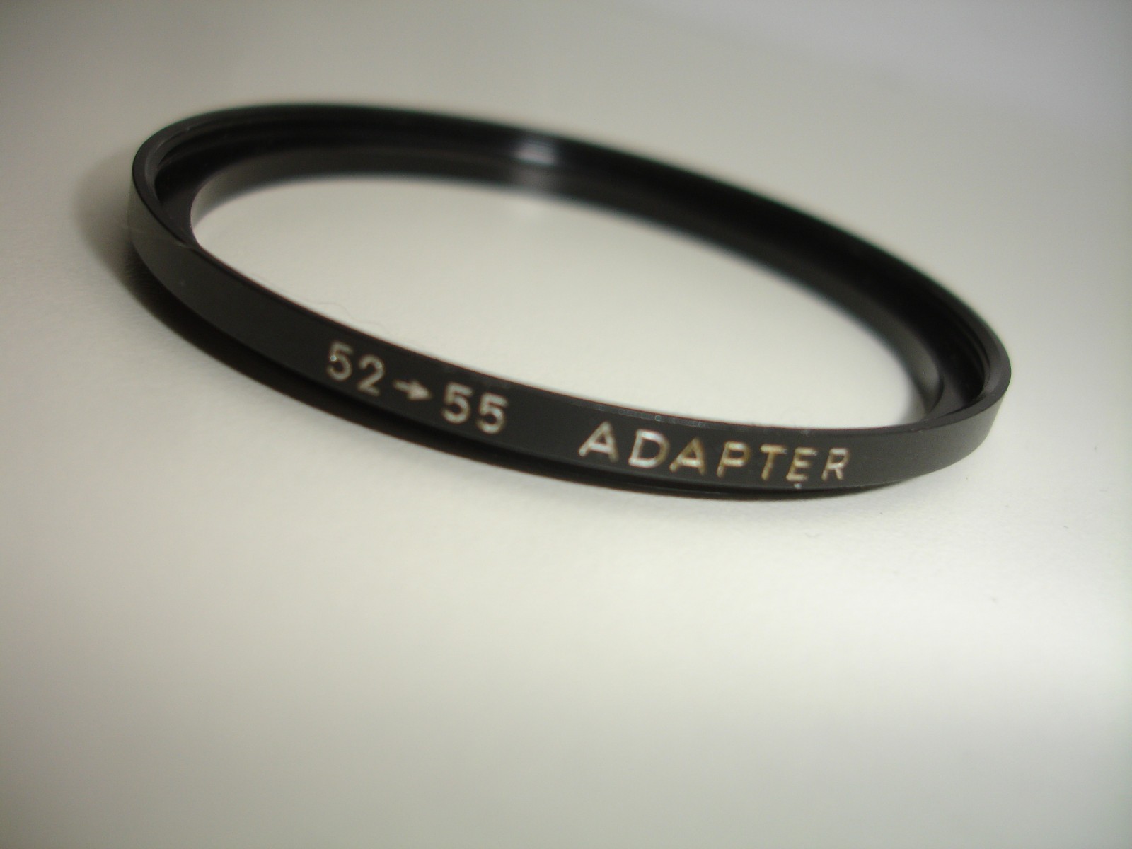 Minolta 52-55mm step up ring (55mm filters on 52mm diameter)