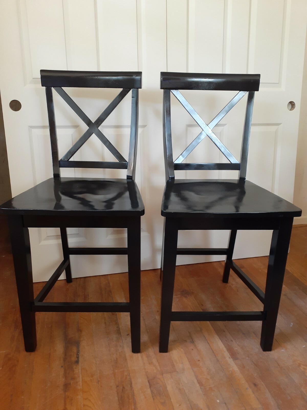 Pair of contemporary high Black Barstools - solid wood