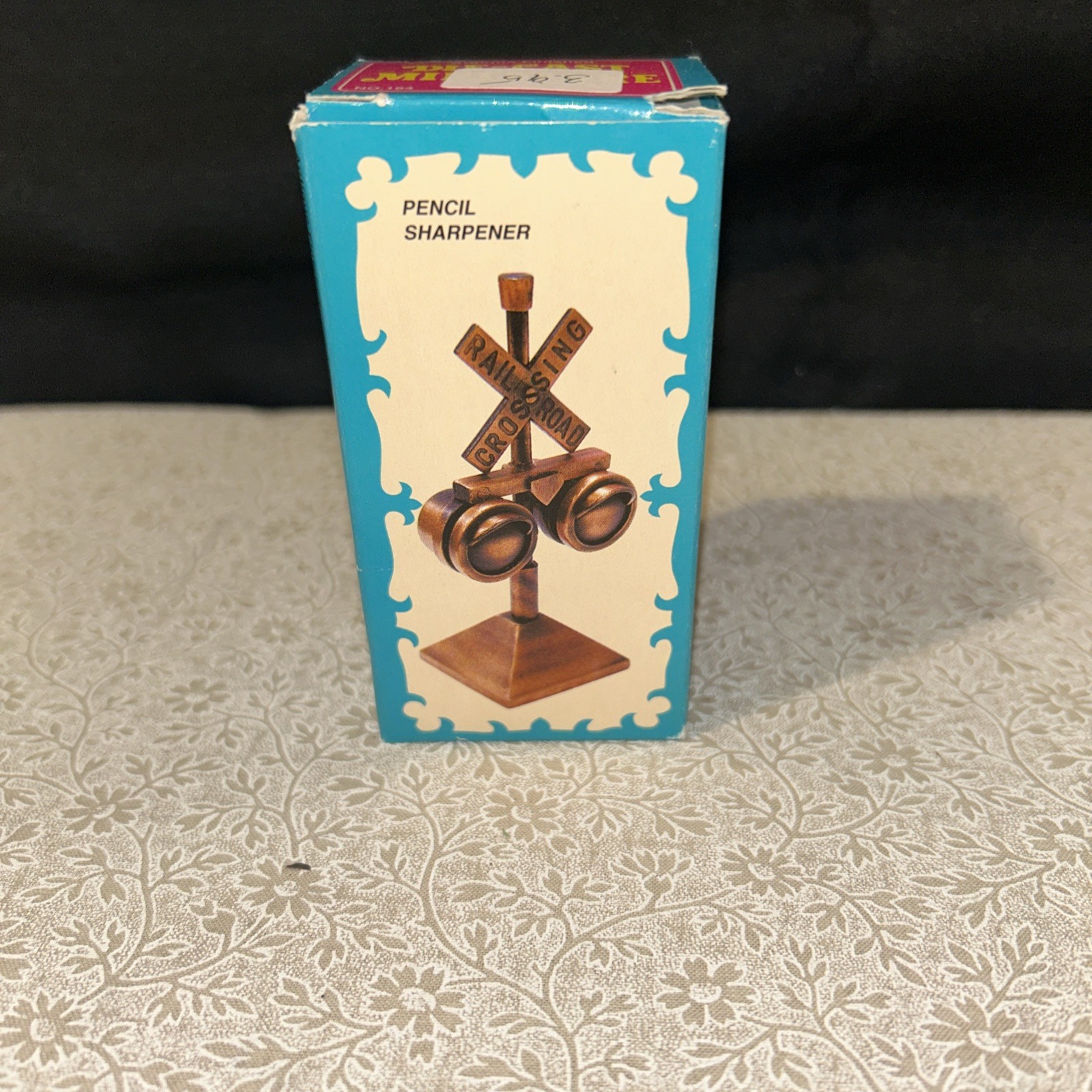 vintage die cast miniature pencil sharpener