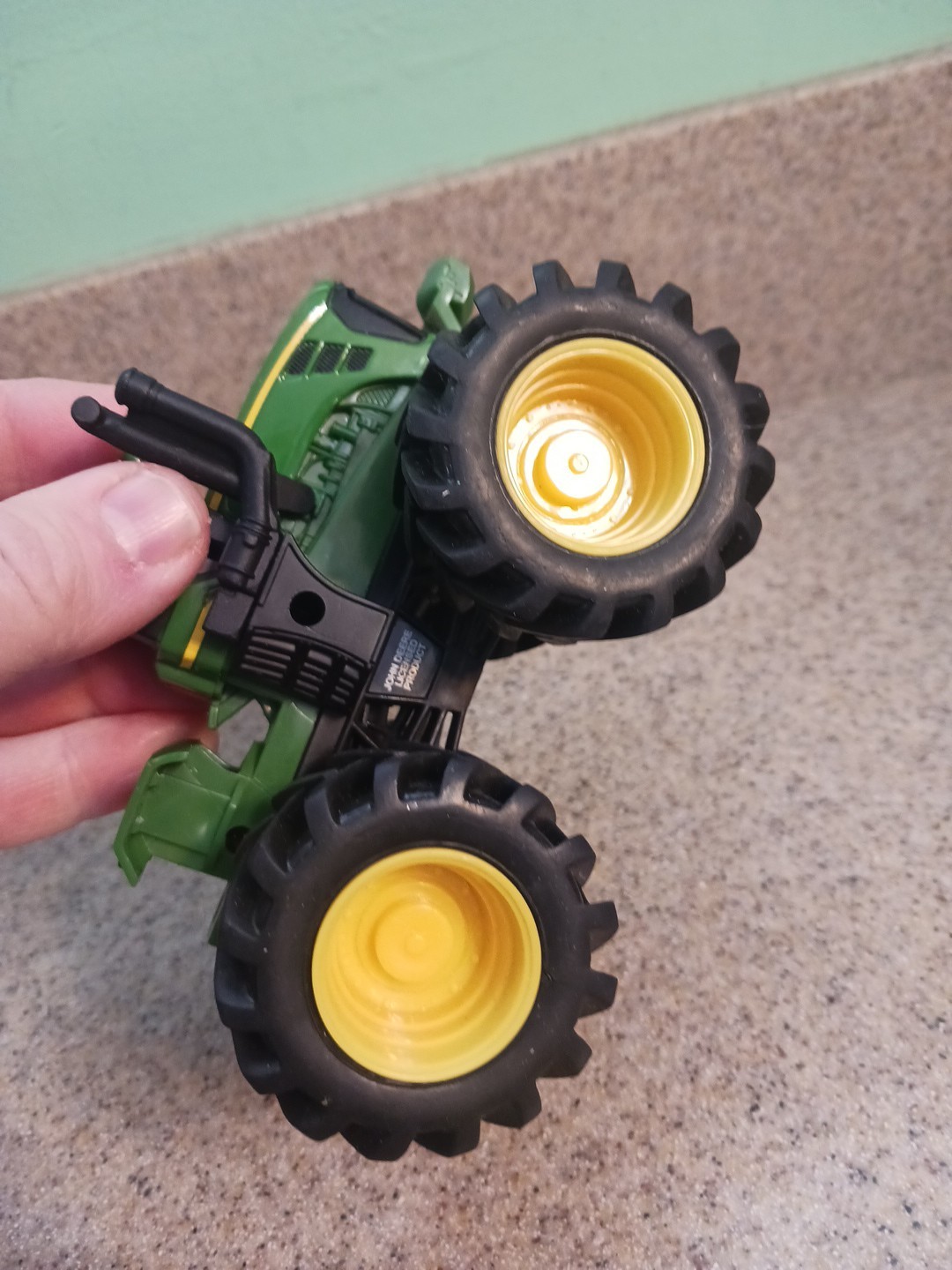Ertl John Deere Plastic Tractor in picture John Deere licensed