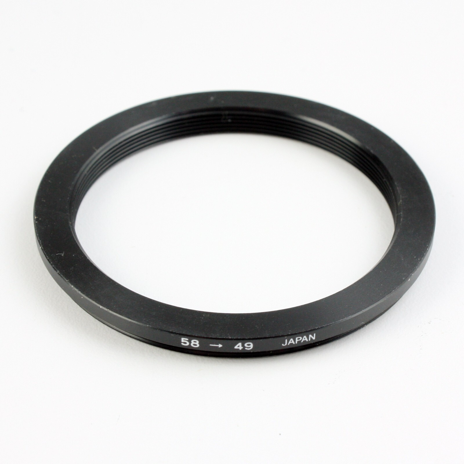 Unbranded 58-49mm Step-Down Adapter Ring New Old Stock