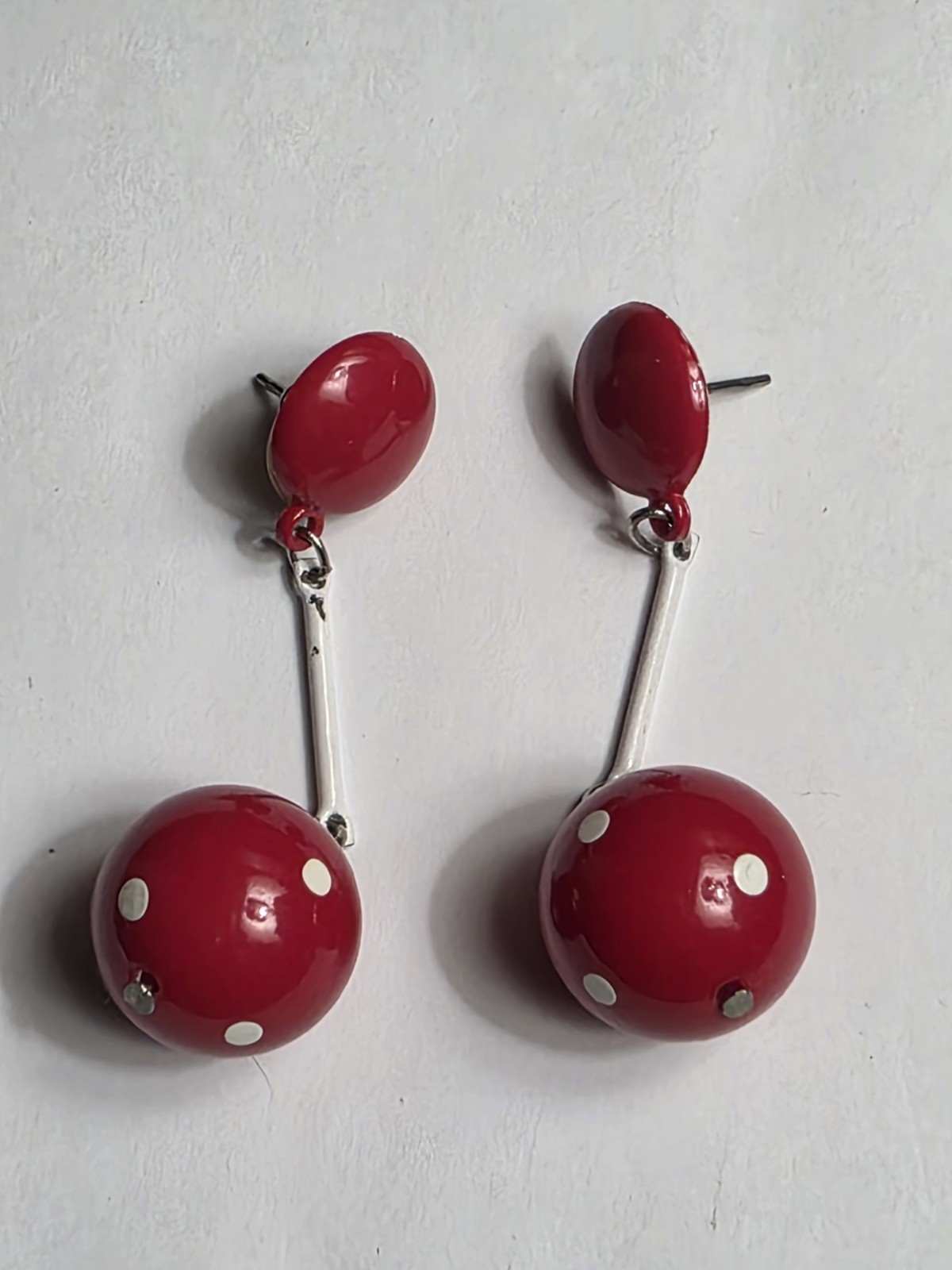 Red lucite white polka dot dangle earrings