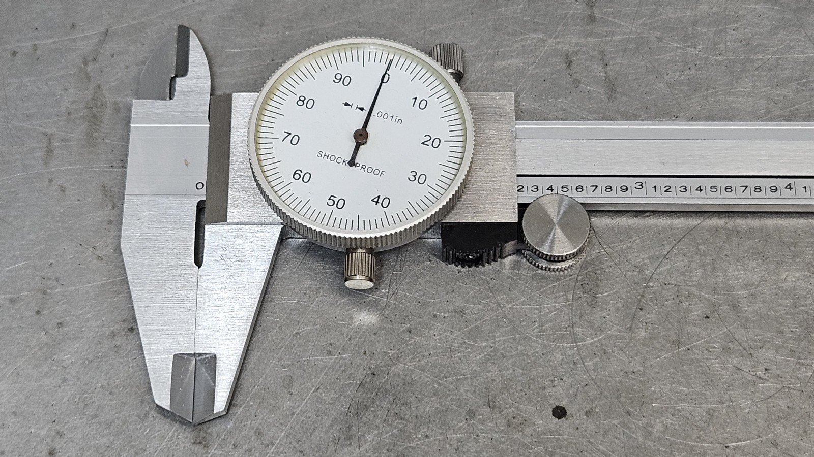 Starrett No. 657AA magnetic base + 1" dial indicator - micrometer - caliper
