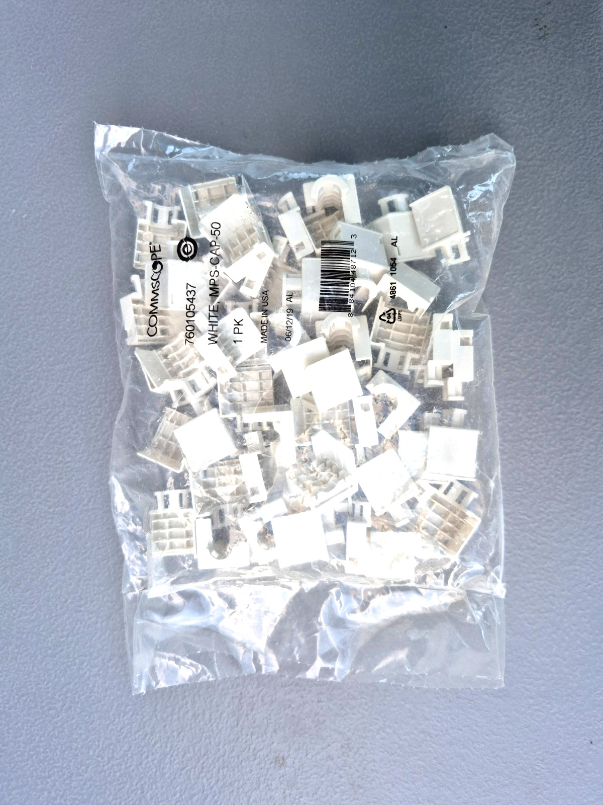 Brand New CommScope Systimax 760105437 MGS-CAP-50 MGS Cap Kit LP White Bag of 50