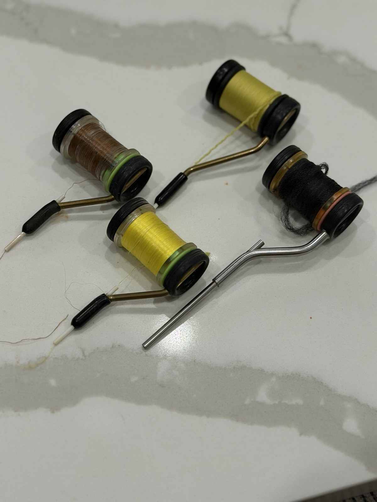 Rite Bobbins, which are specialized adjustable-tension bobbins