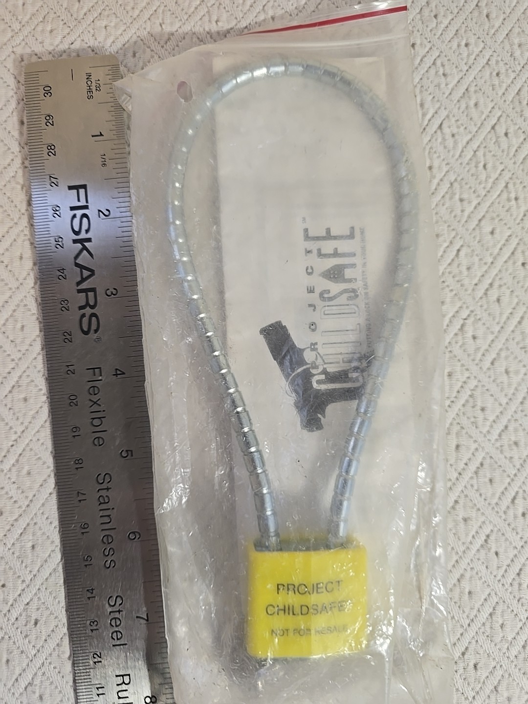 Project Child Safe Lock with Key. Sealed Hand Gun Lock