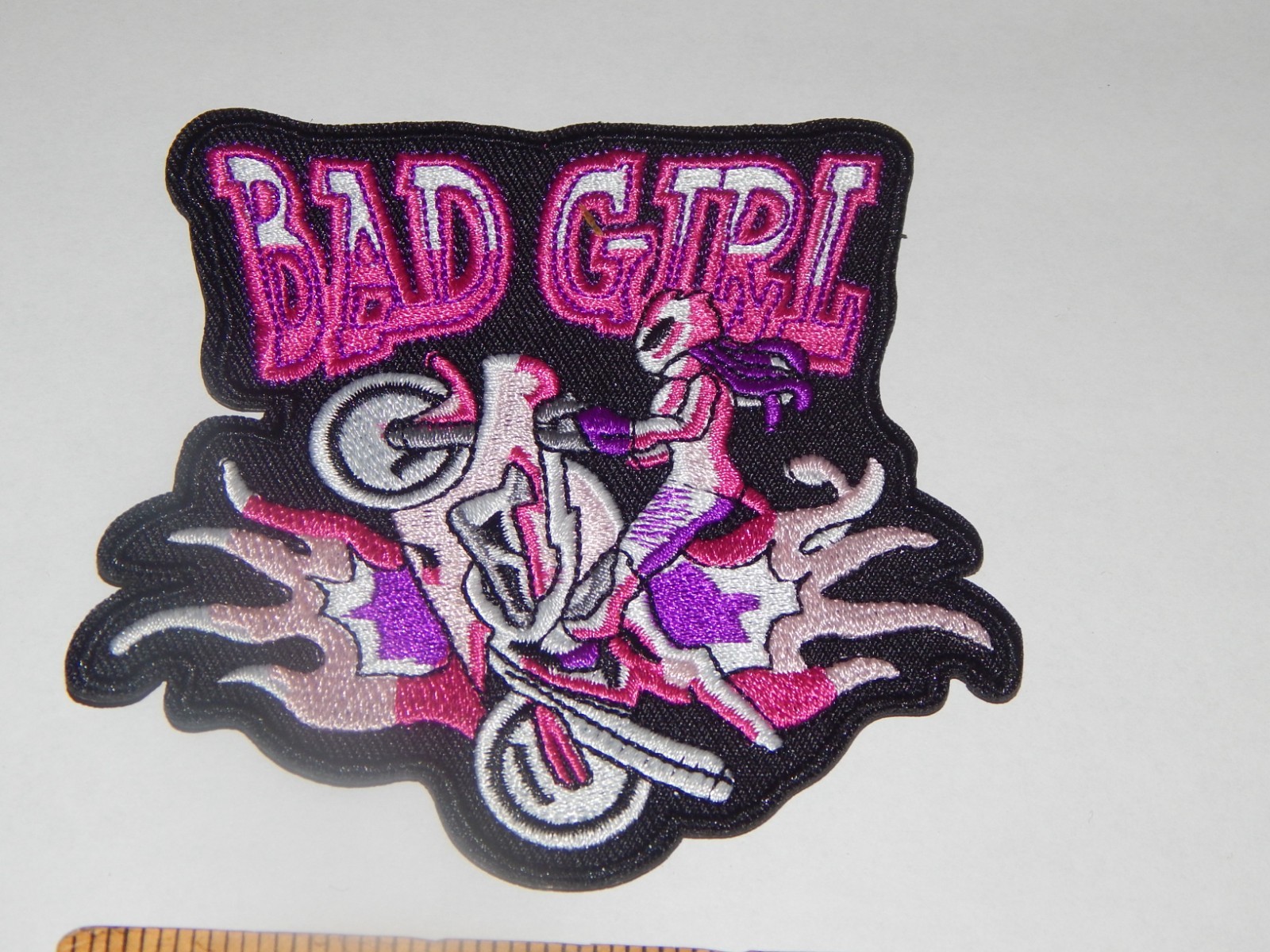 BAD GIRL BIKER GIRL IN PINK IRON-ON / SEW-ON EMBROIDERED PATCH 4 " X 3 1/2 "