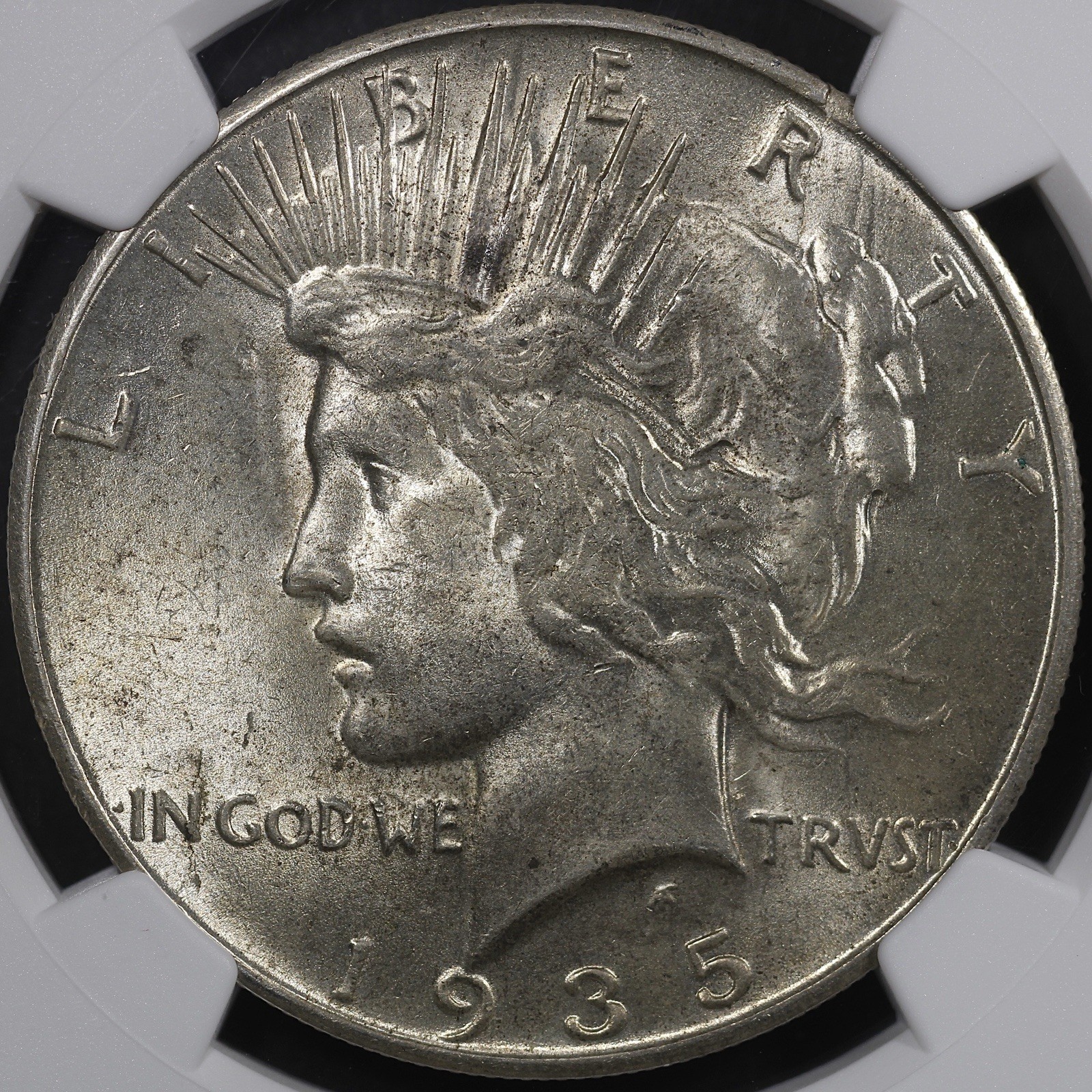 1935-S Peace Dollar - $1 NGC MS62 - Lustrous Example!