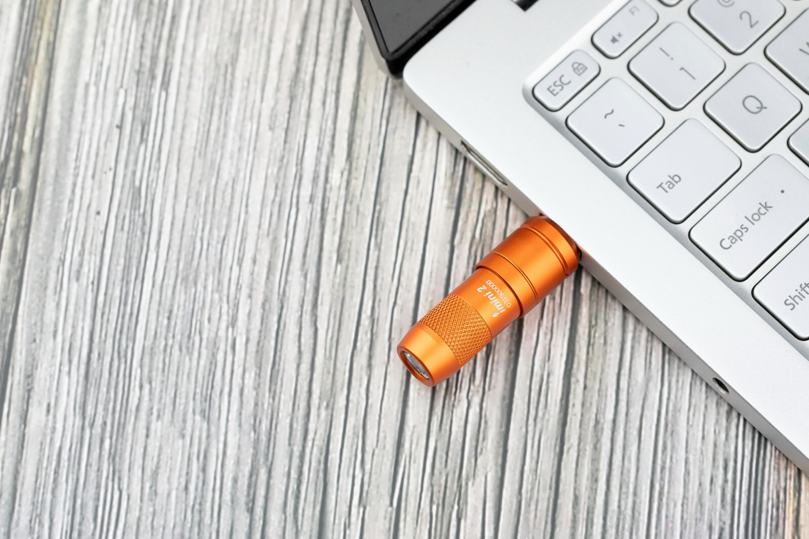 Olight imini 2 Orange Rechargeable Mini Keychain Flashlight, 50 Lumens