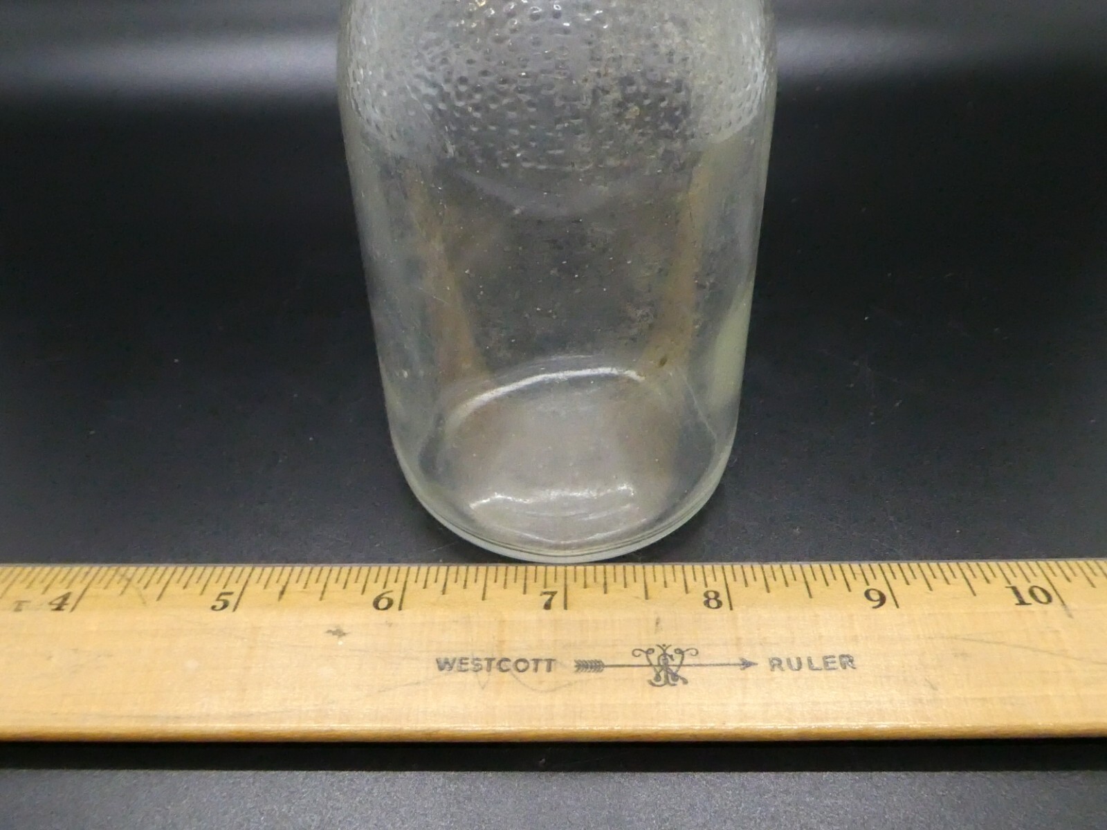 Vintage Small Clear Glass Bottle Patterned on Top 5.5" x 2"