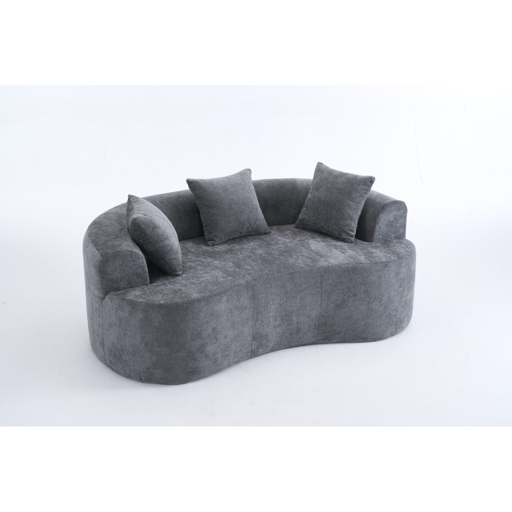 Crescent-shaped sofa, modern low-back design with deep cushions, self-inflating