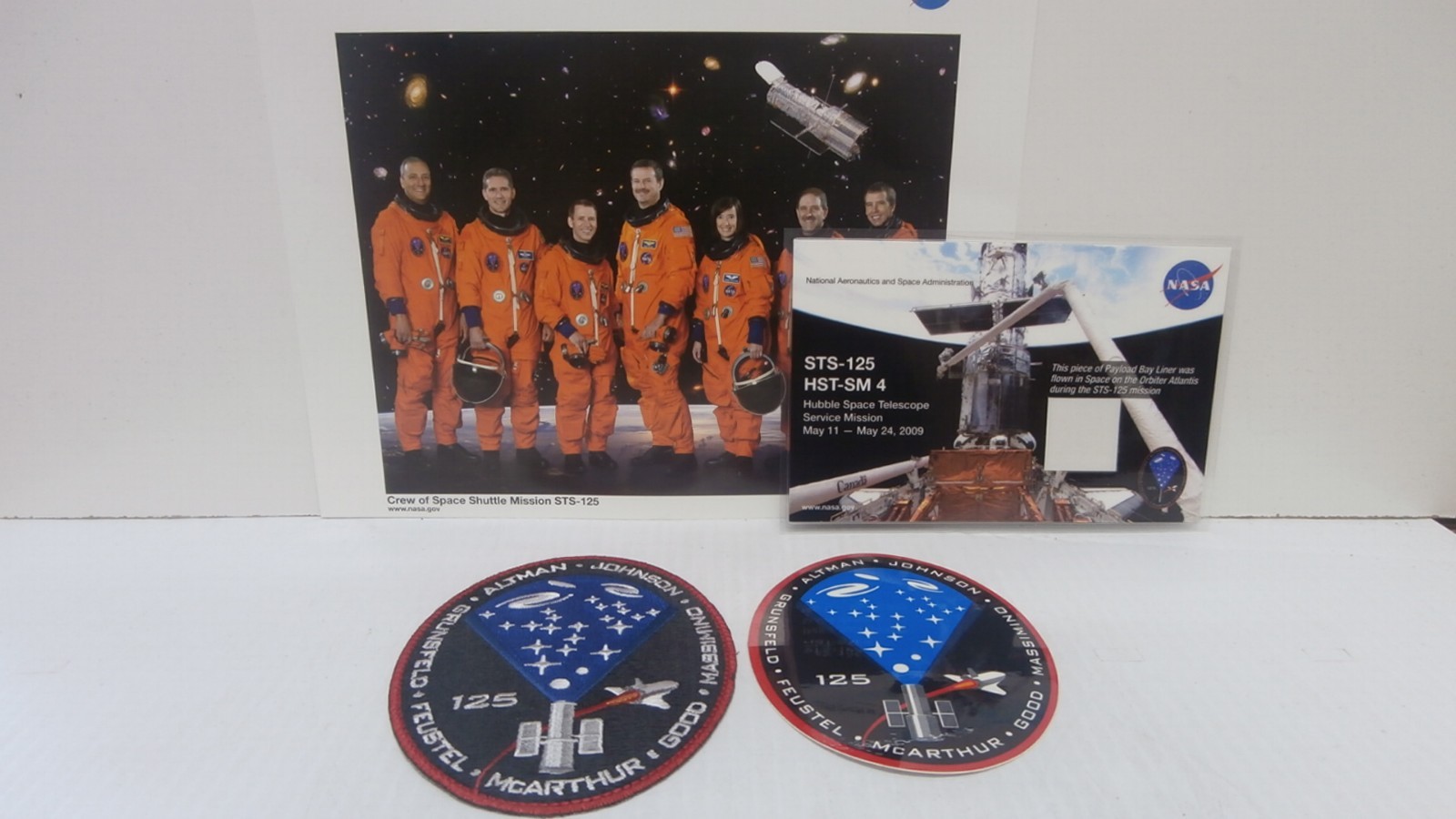 Lot of 4-NASA STS-125 HST-SM 4 Flown Payload Bay Liner, Patch, Decal, Crew Photo