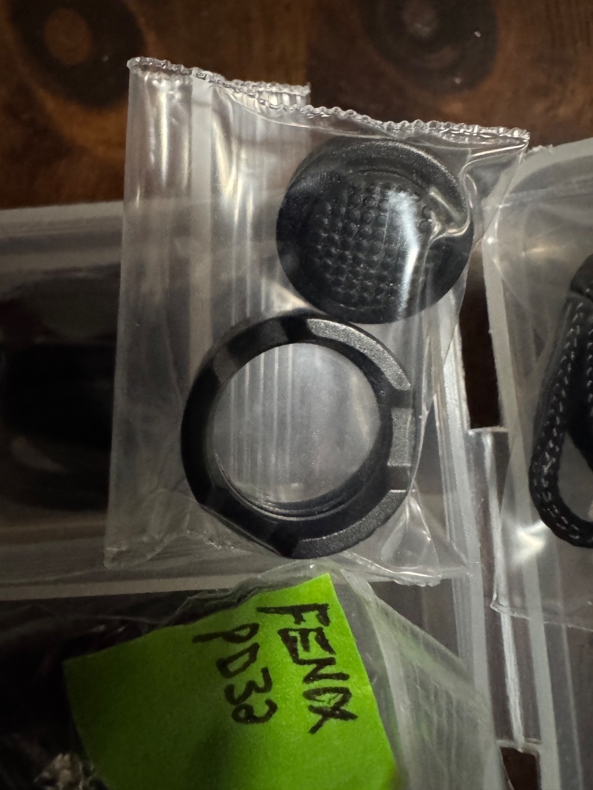 Flashlight Lanyards, O rings and an Olight Flashlight Charger