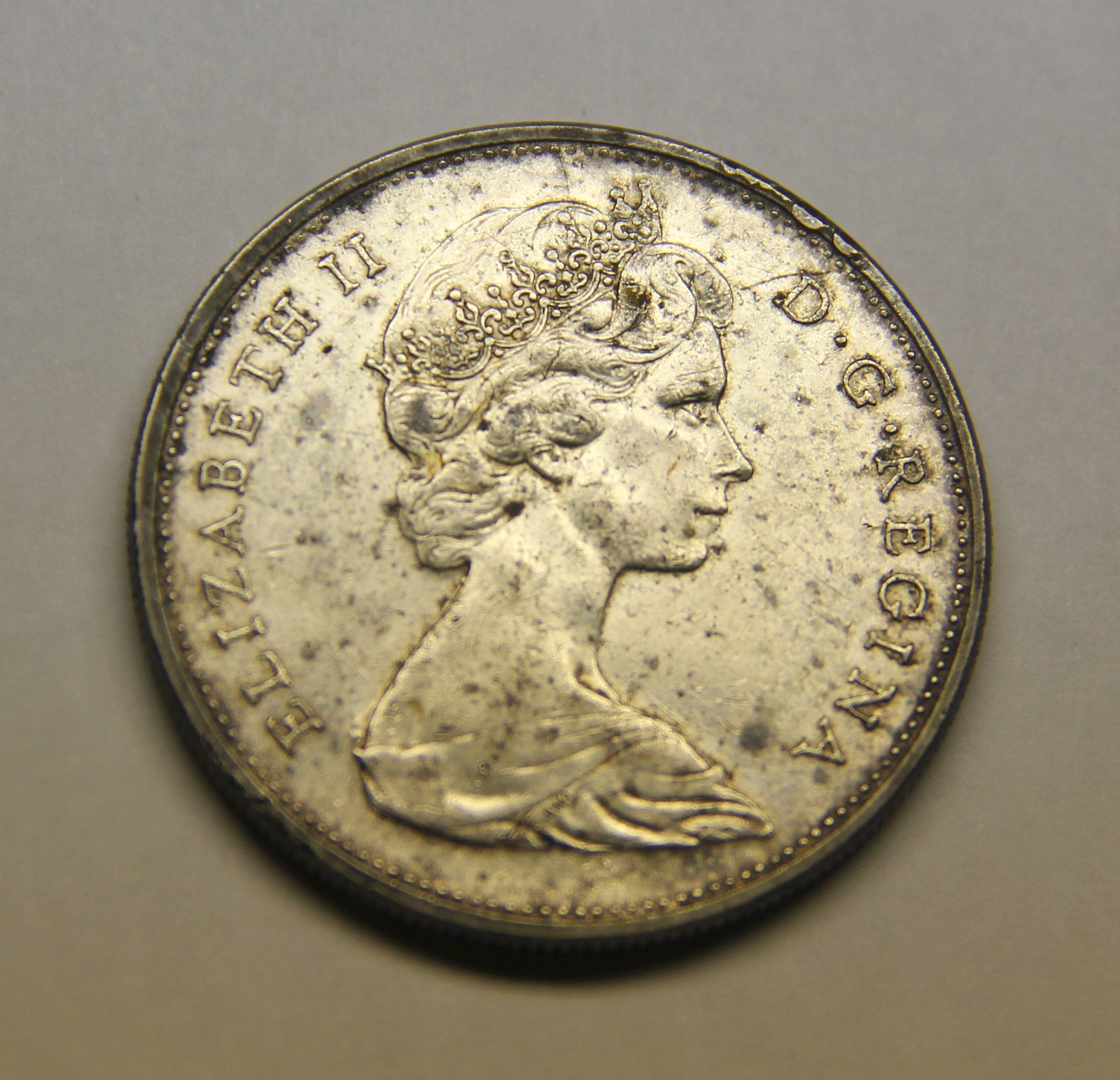 1965 Canada 80% Silver Dollar Blunt 5 Small Bead, Elizabeth II & Canoe