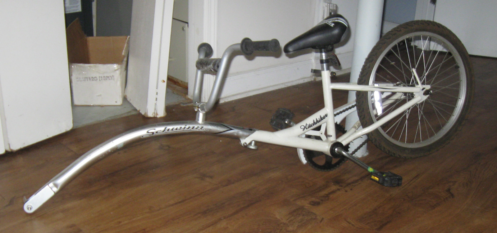 Schwinn "HitchHiker" Third-Wheel kids add-on coast or pedal  trailer
