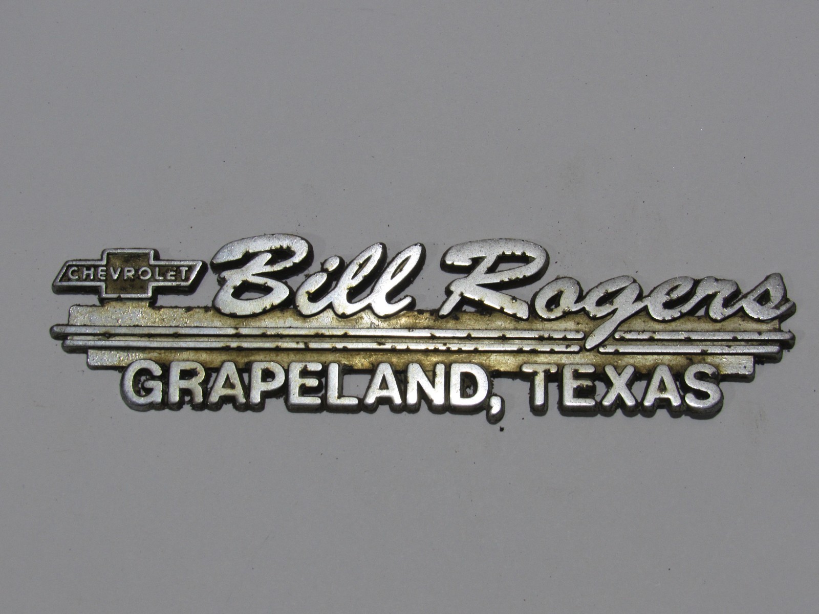 Vintage Bill Rogers Chevrolet Grapeland Texas Metal Dealer Badge Emblem Tag TX