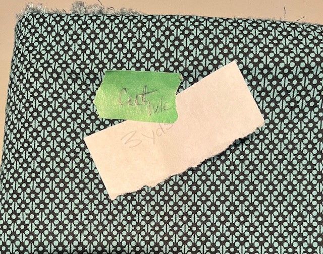 Quality Quilter's Cotton in teal and black small print. New, prewashed/dried