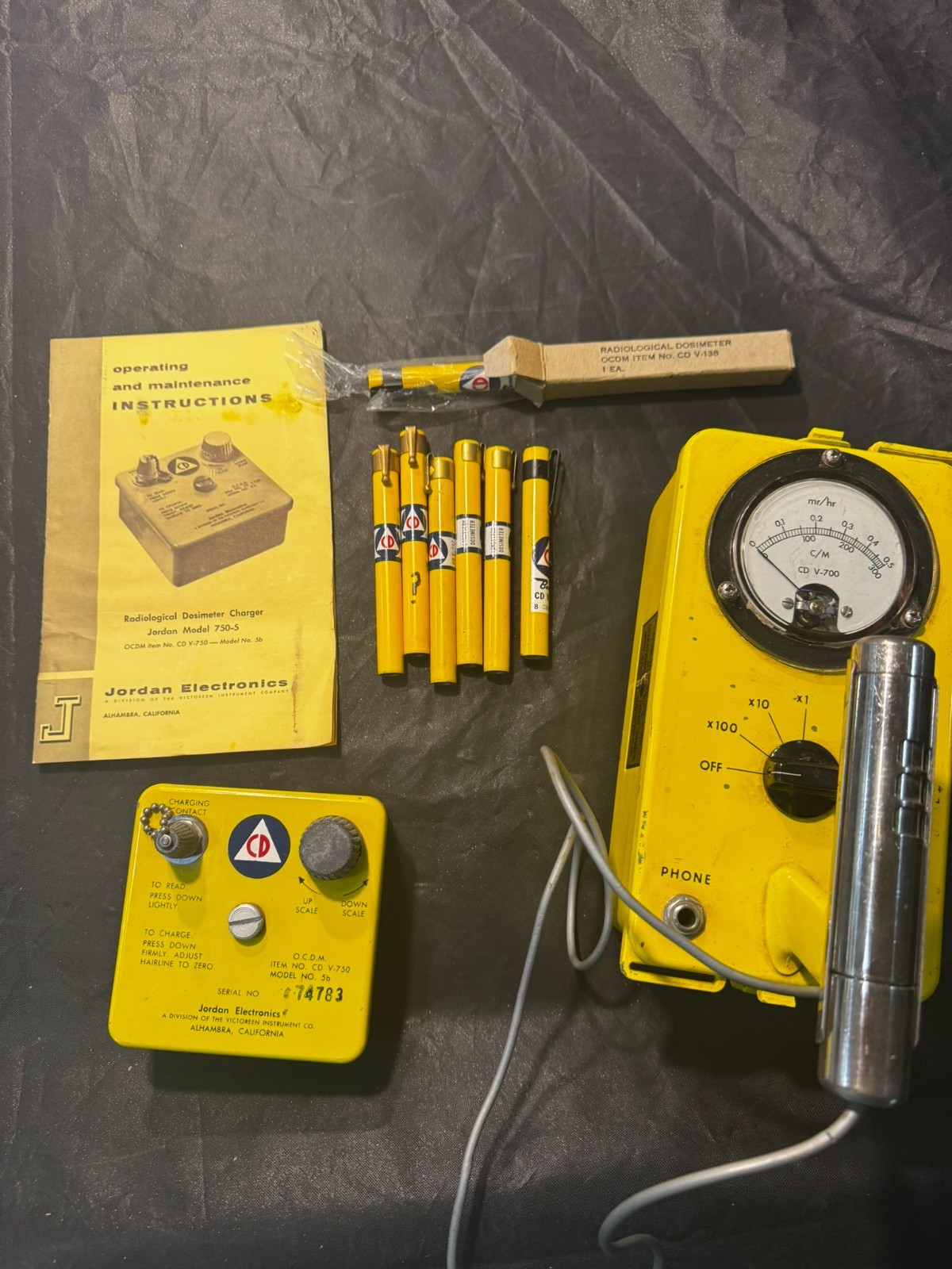Vintage CD Geiger counter, dosimeter charger and 7 dosimeters
