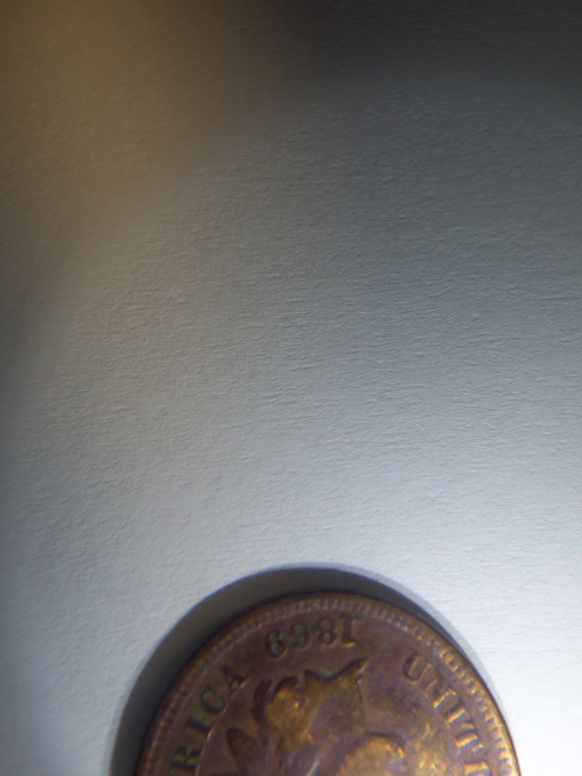 A RARE 1869 INDIAN HEAD PENNY